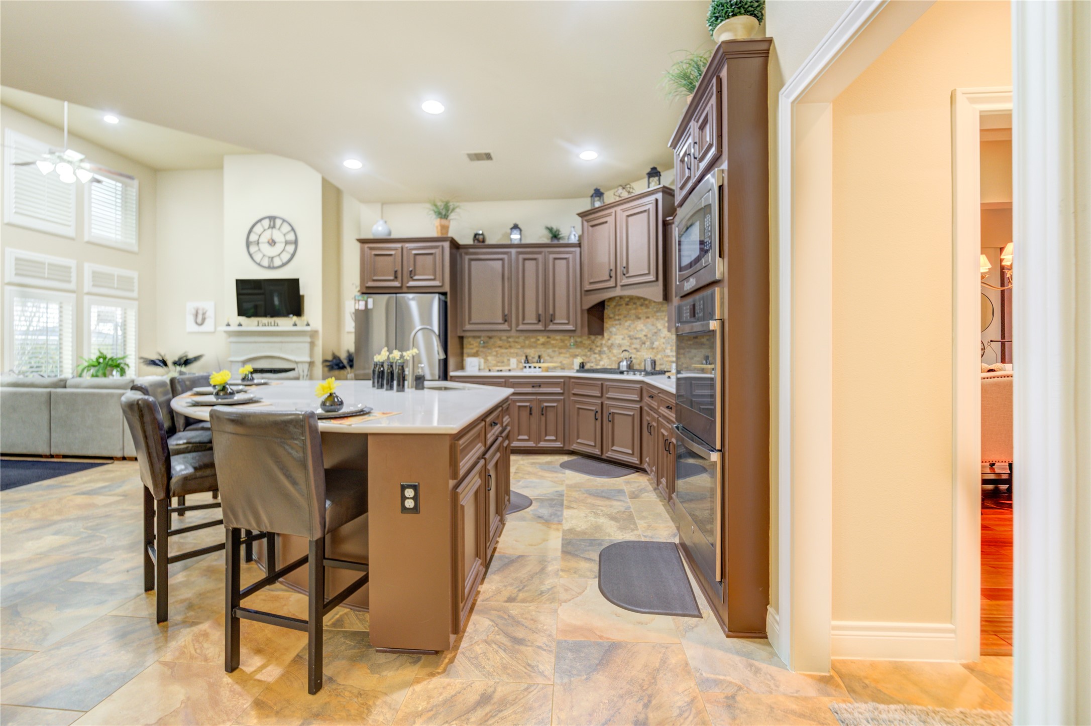 25831 Morgan Springs Spring, TX 77373 - Photo 19 of 49 a kitchen with a sink refrigerator and cabinets