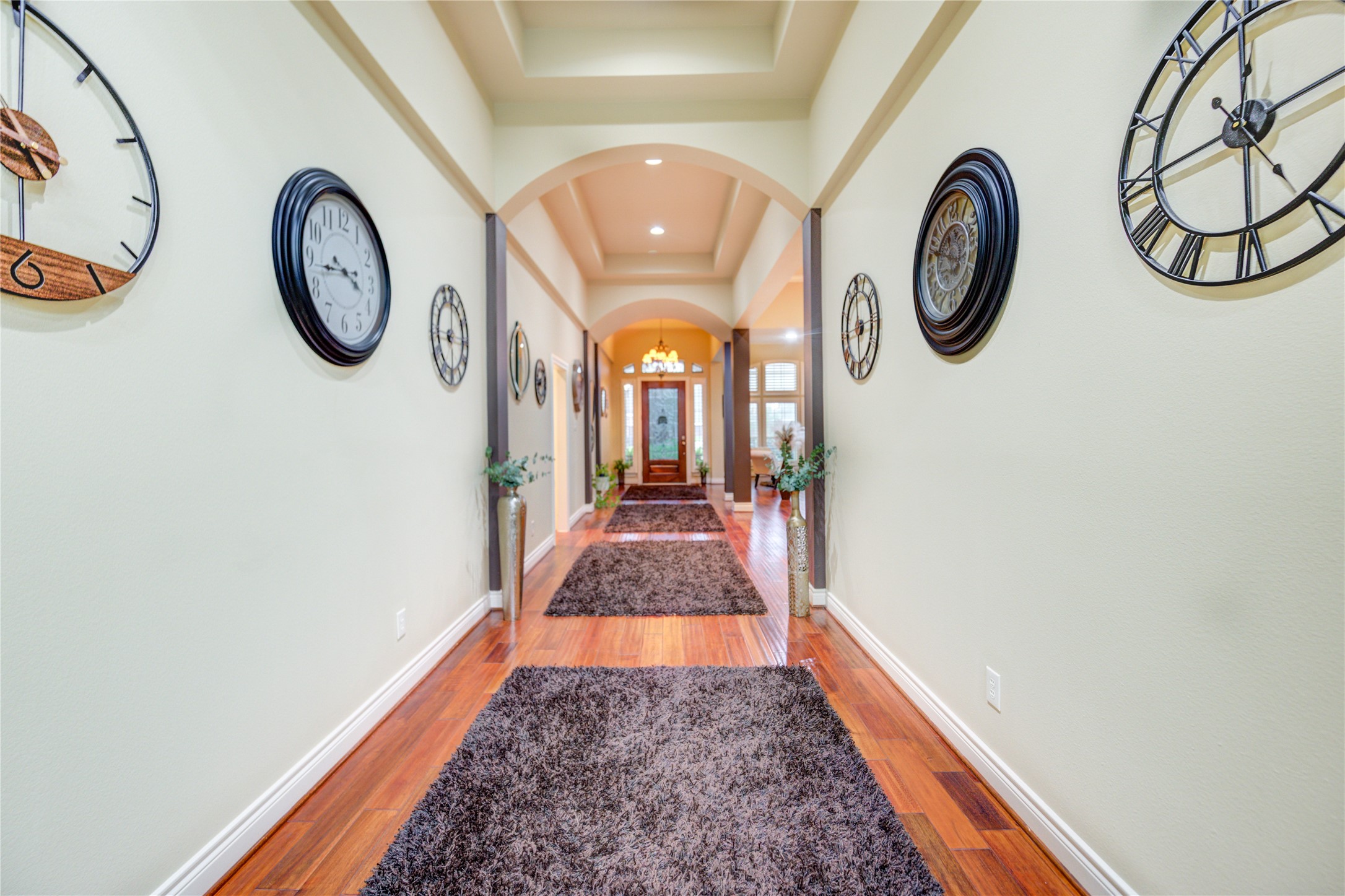 25831 Morgan Springs Spring, TX 77373 - Photo 25 of 49 a view of a hallway with paintings on the wall