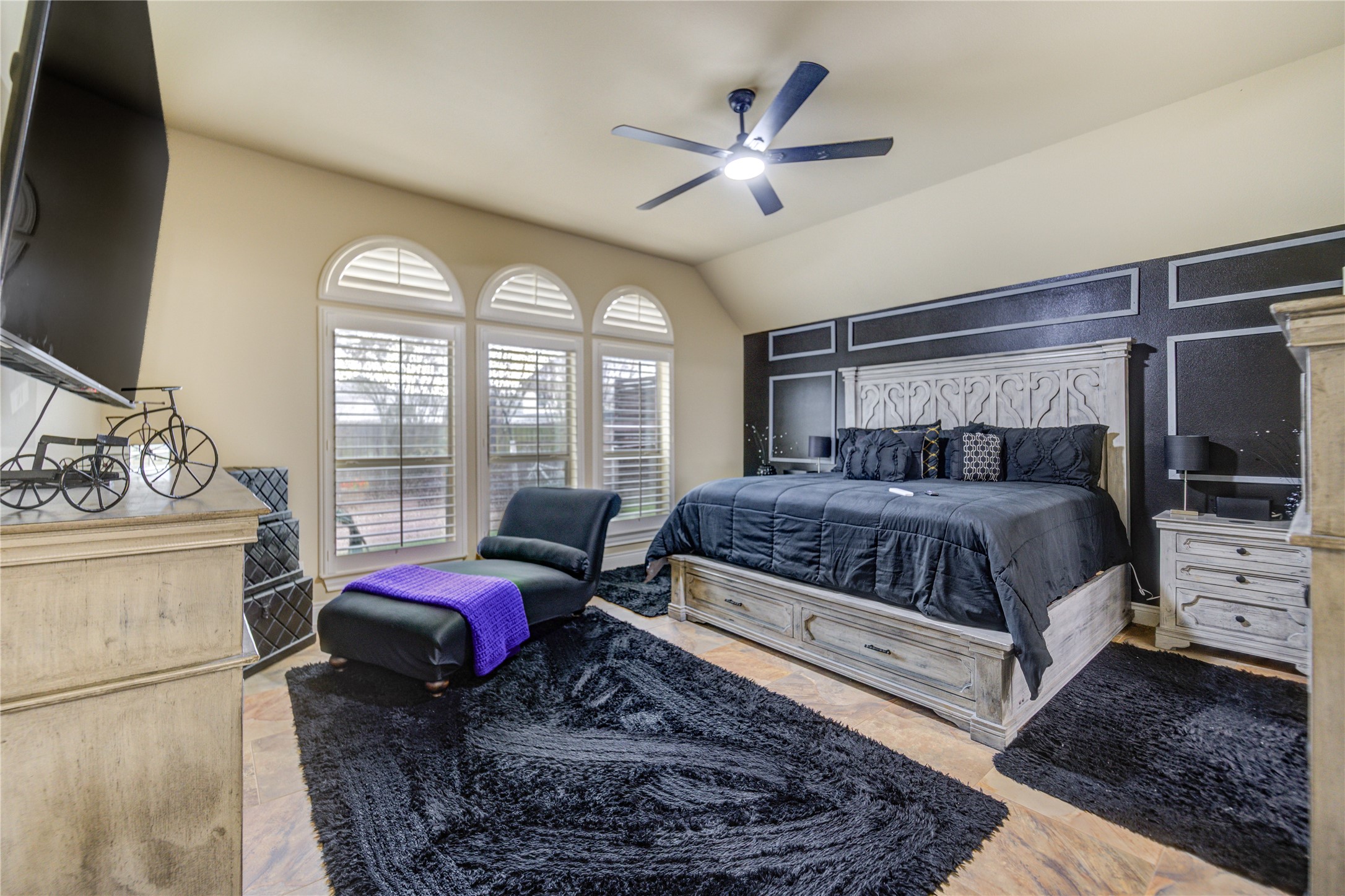 25831 Morgan Springs Spring, TX 77373 - Photo 27 of 49 a bedroom with a bed a chandelier and a window