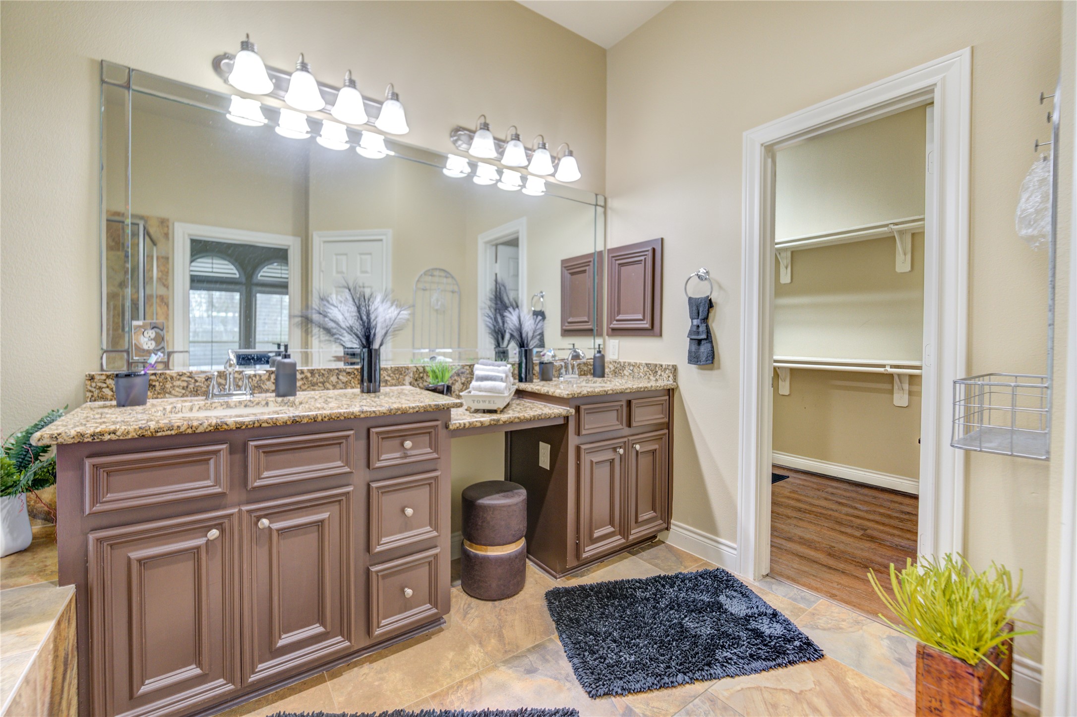 25831 Morgan Springs Spring, TX 77373 - Photo 30 of 49 a spacious bathroom with a granite countertop sink a toilet and a mirror
