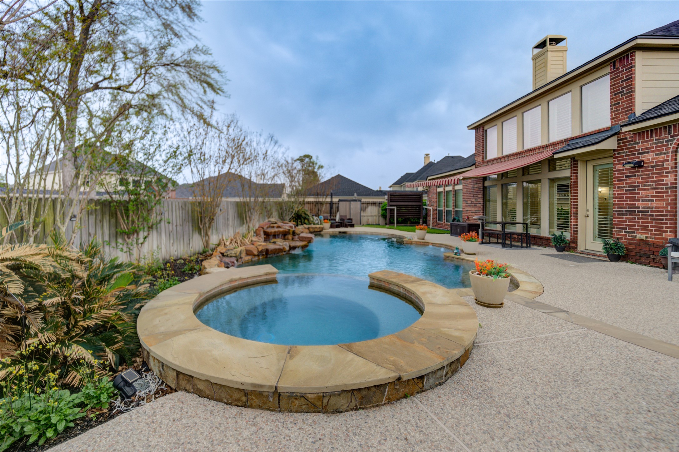 25831 Morgan Springs Spring, TX 77373 - Photo 41 of 49 a view of a house with swimming pool and sitting area