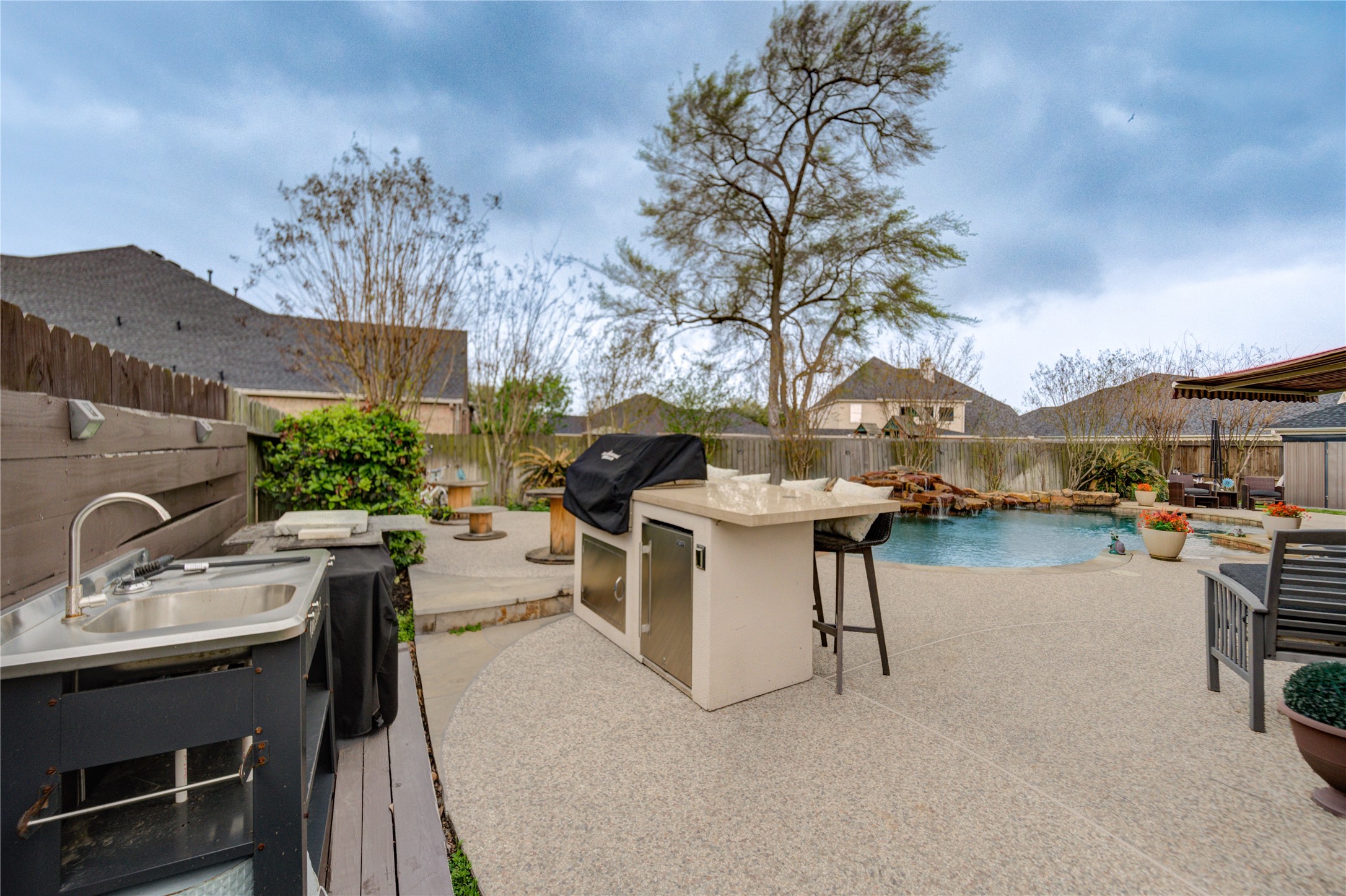 25831 Morgan Springs Spring, TX 77373 - Photo 43 of 49 a view of a patio with swimming pool