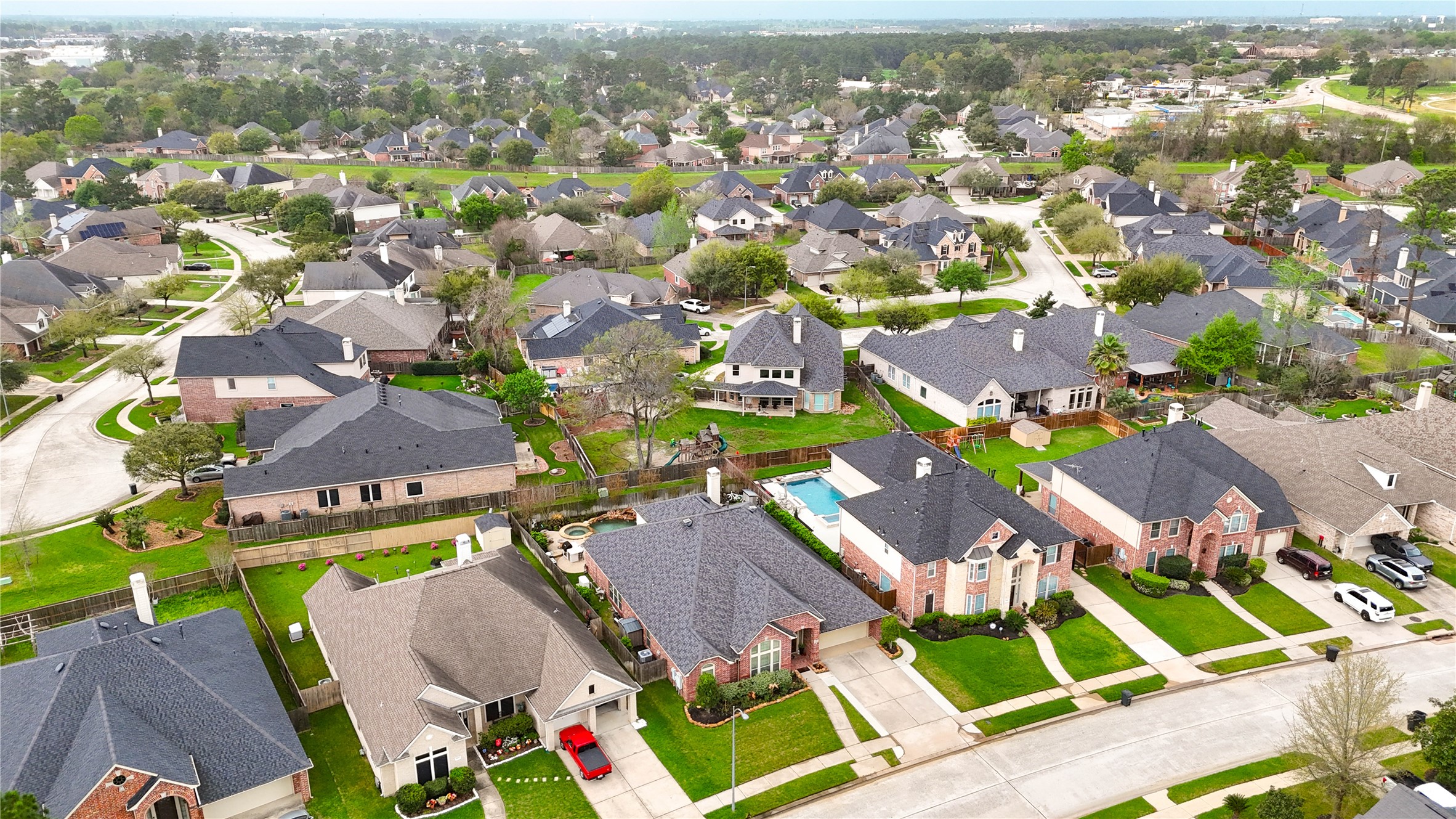 25831 Morgan Springs Spring, TX 77373 - Photo 49 of 49 an aerial view of residential houses with outdoor space