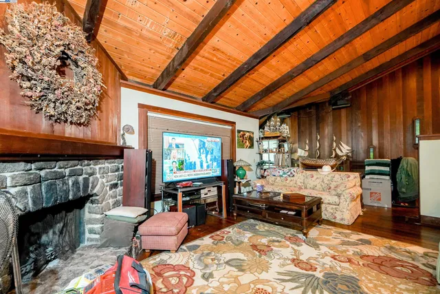 a kitchen with stainless steel appliances granite countertop a stove and cabinets