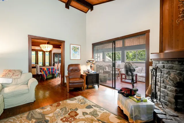 a bedroom with a bed dresser and a large mirror