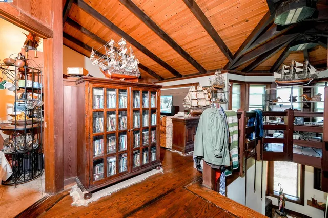 a kitchen with stainless steel appliances kitchen island granite countertop a stove a sink and a microwave