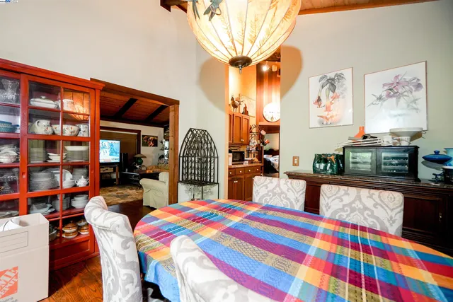 a view of a chairs and table in a patio