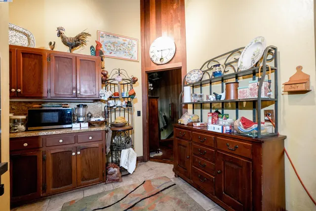 a bathroom with a toilet a sink and a window
