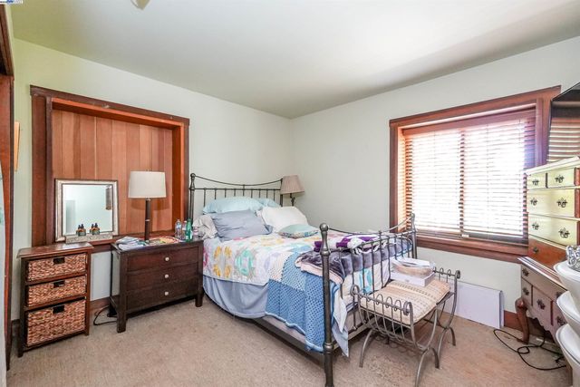 a view of a wooden fence and a bench