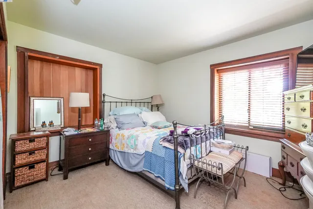 a view of a wooden fence and a bench