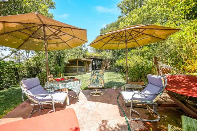a view of a house with a tree