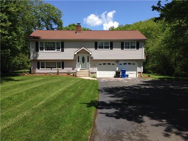 436 Hattertown Road Monroe, CT 06468 - Photo 1 of 1 a front view of a house with a yard patio and fire pit