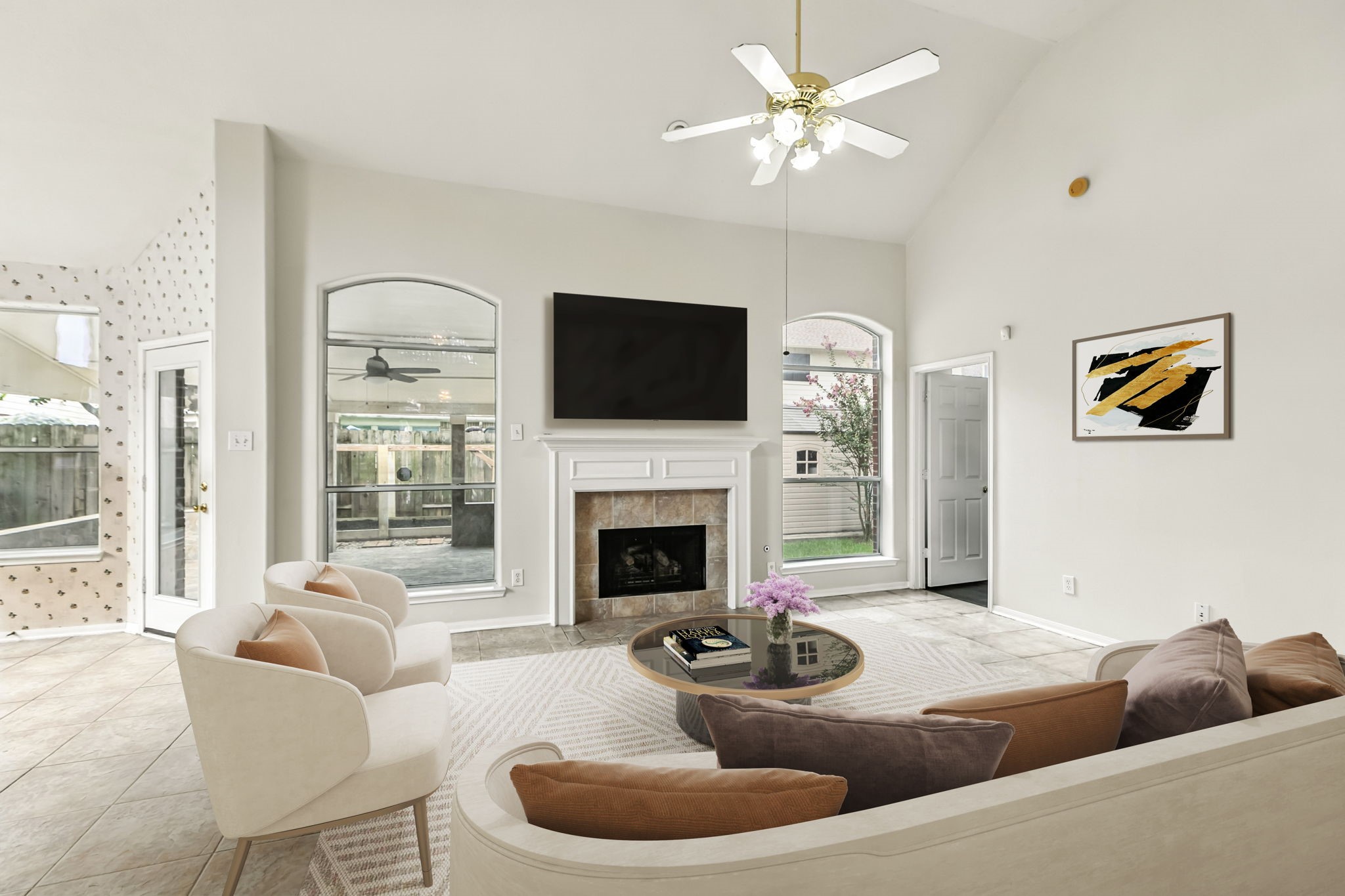 20907 Divellec Lane Spring, TX 77388 - Photo 11 of 46 a living room with furniture a fireplace and a flat screen tv