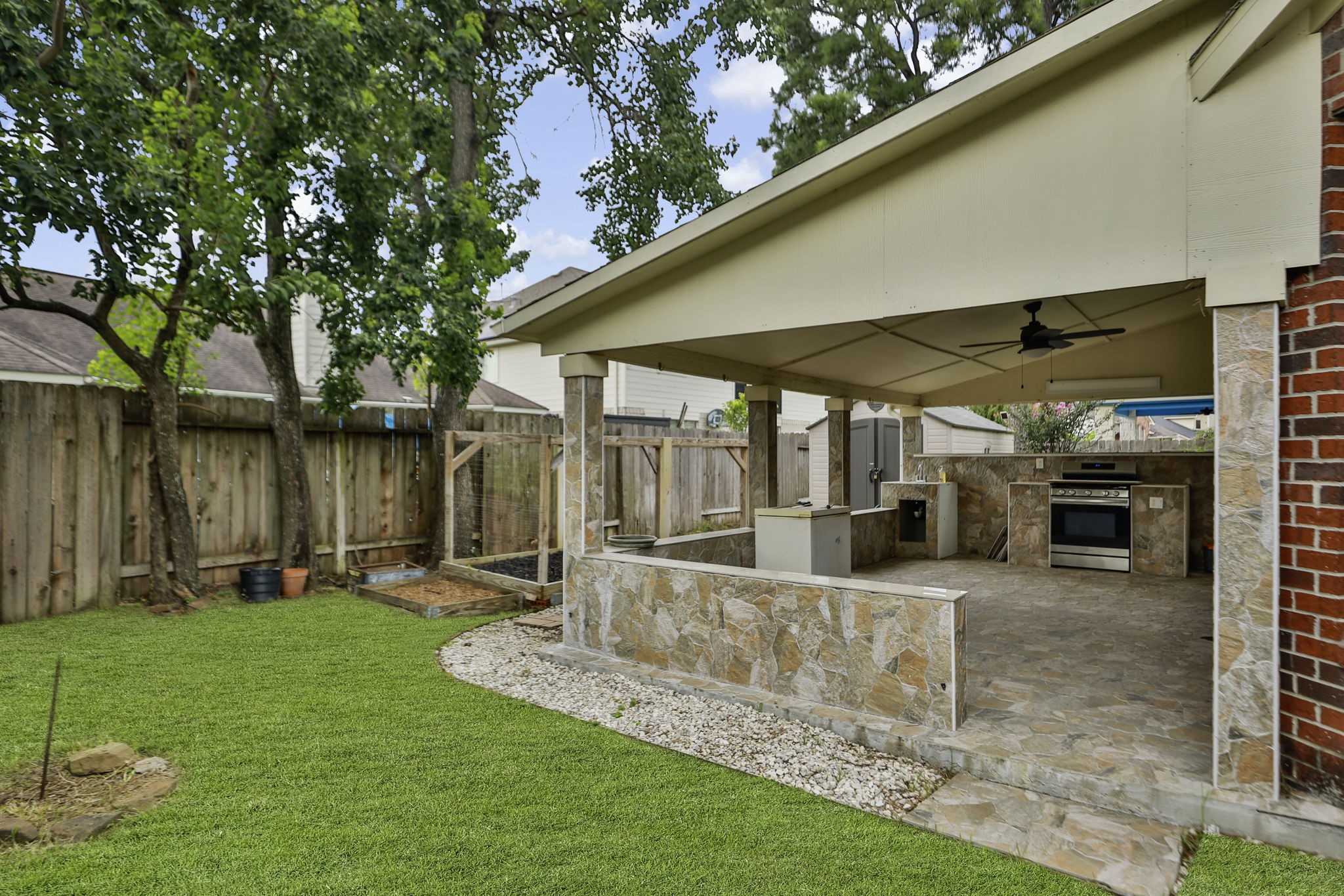 20907 Divellec Lane Spring, TX 77388 - Photo 2 of 46 a view of a chair and table in backyard of the house