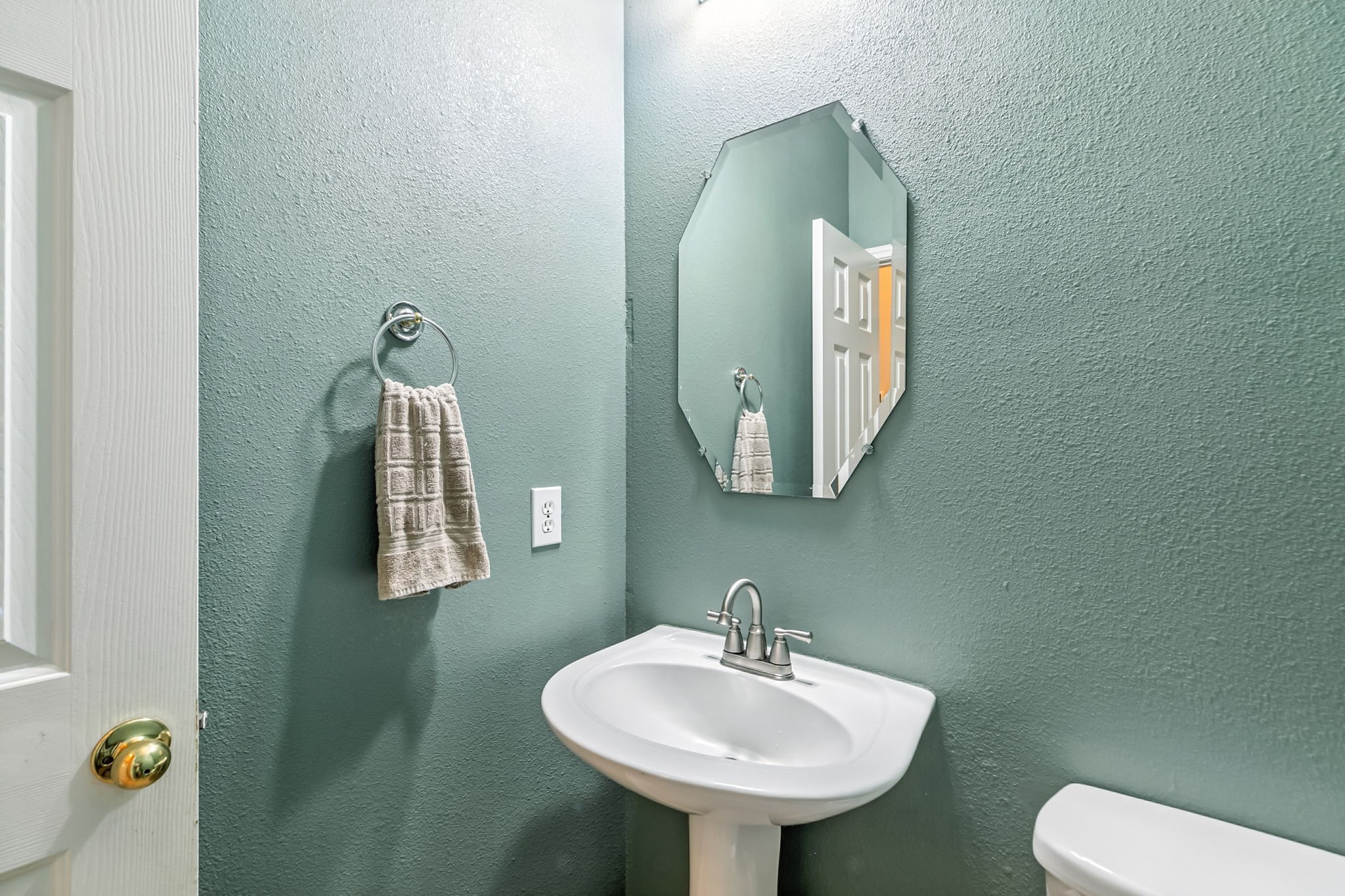 20907 Divellec Lane Spring, TX 77388 - Photo 21 of 46 a bathroom with a toilet sink and mirror
