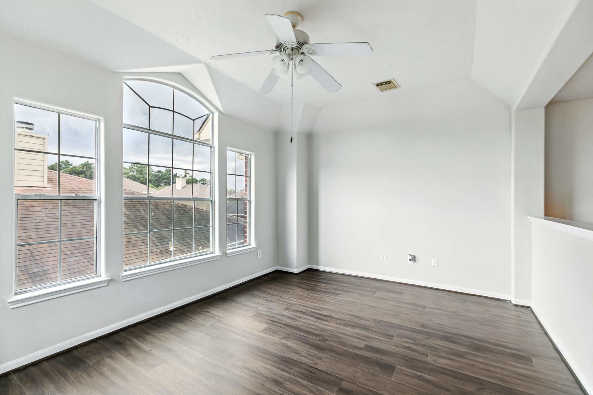 20907 Divellec Lane Spring, TX 77388 - Photo 28 of 46 wooden floor in an empty room with a window
