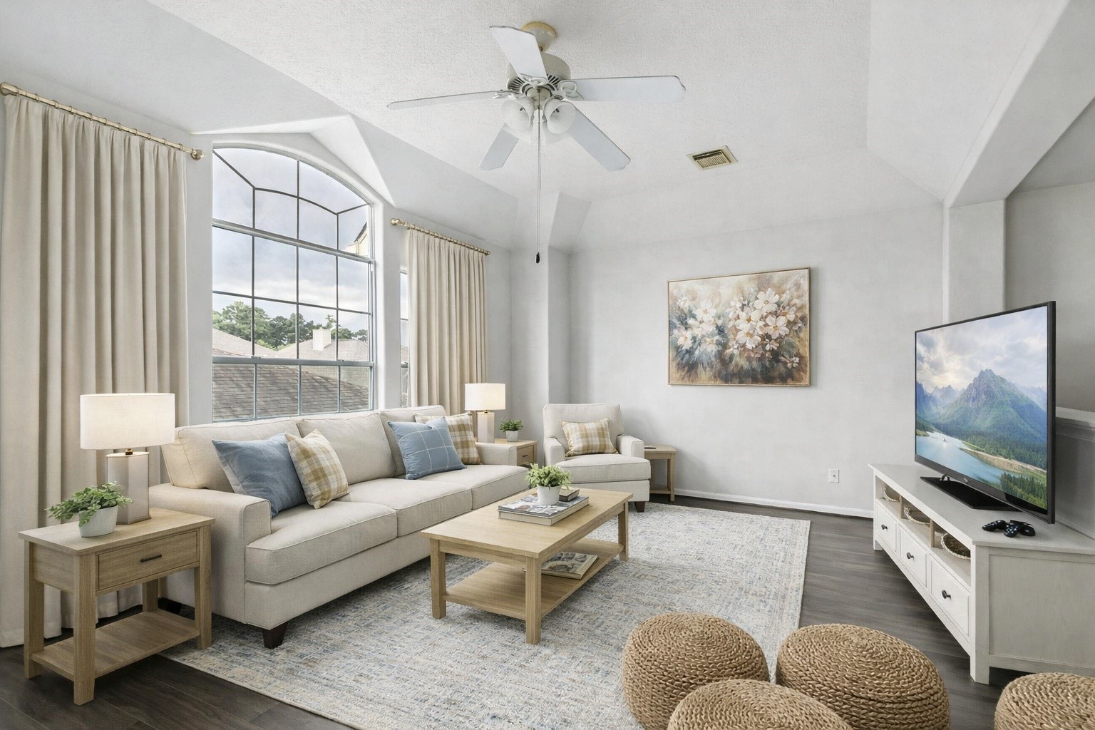 20907 Divellec Lane Spring, TX 77388 - Photo 29 of 50 a living room with furniture and a flat screen tv