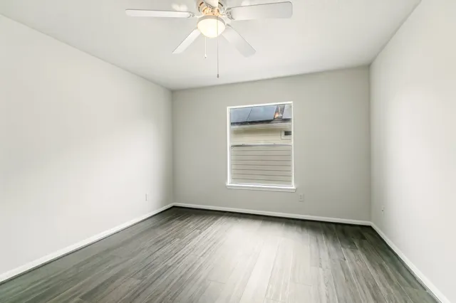 a view of living room with furniture and rug
