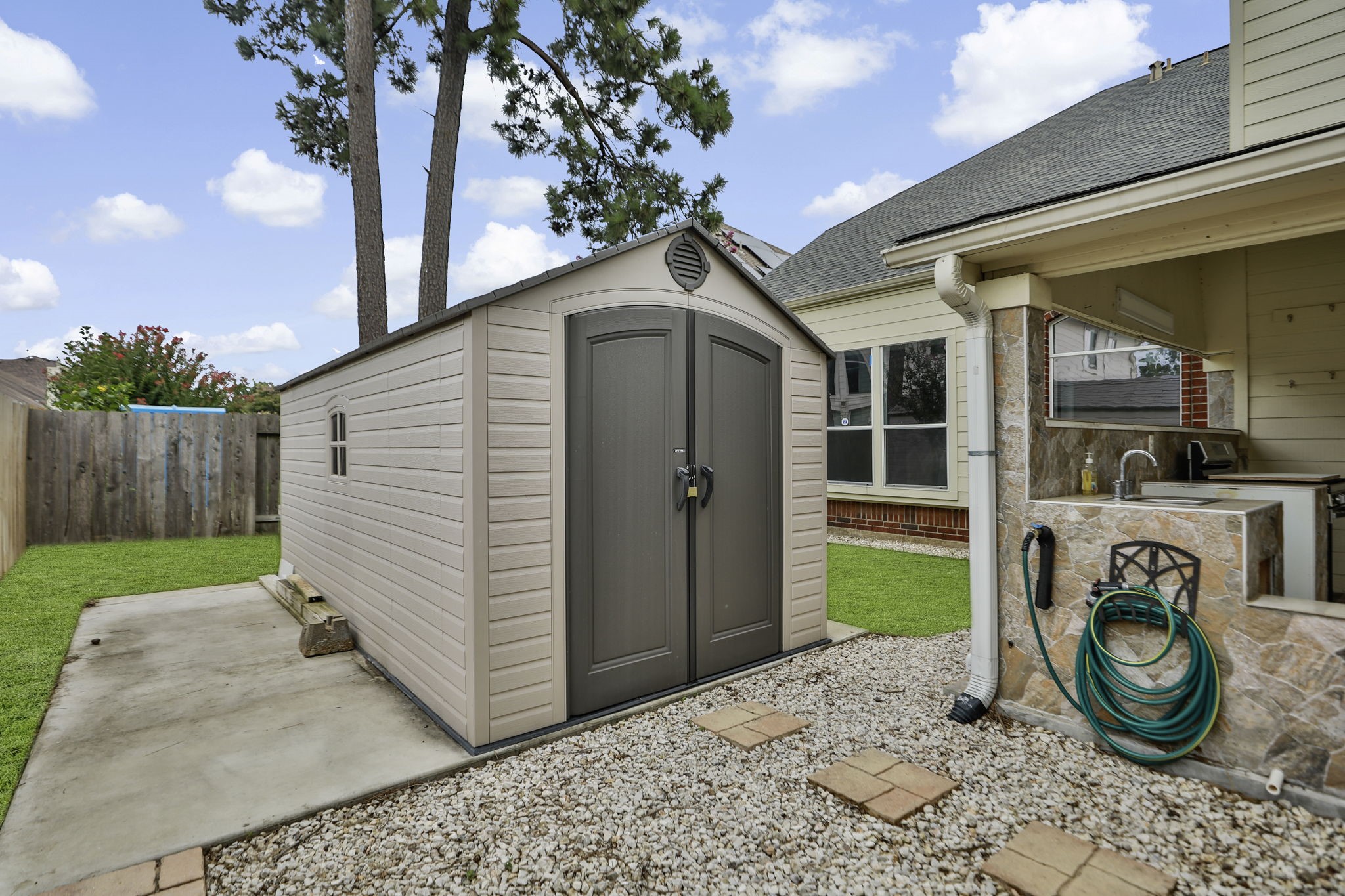 20907 Divellec Lane Spring, TX 77388 - Photo 38 of 50 a view of a house with a yard and garage