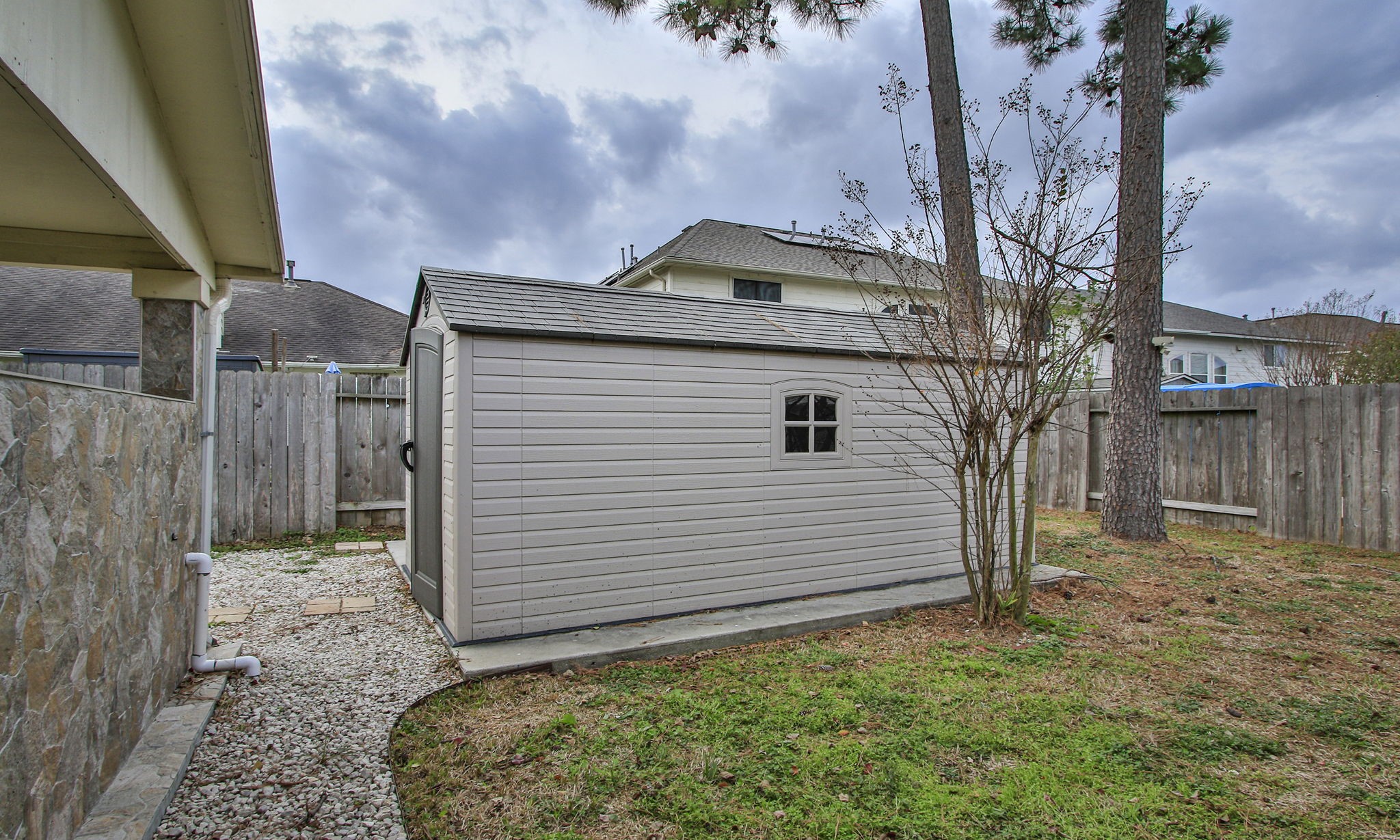 20907 Divellec Lane Spring, TX 77388 - Photo 39 of 50 a house view with a backyard space