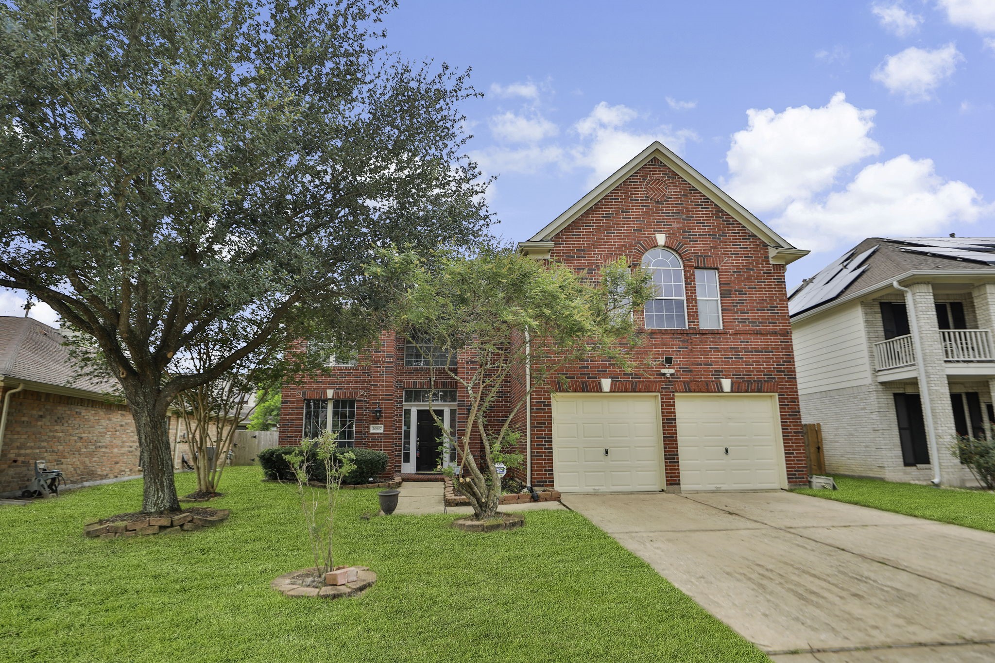 20907 Divellec Lane Spring, TX 77388 - Photo 5 of 46 front view of a house with a yard