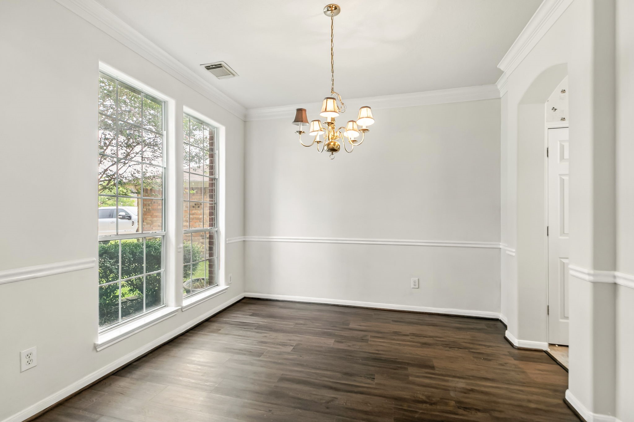 20907 Divellec Lane Spring, TX 77388 - Photo 9 of 46 a view of a livingroom with wooden floor and a large window