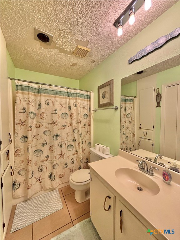 438 15th Street Port O'Connor, TX 77982 - Photo 15 of 26 a bathroom with a sink toilet and shower