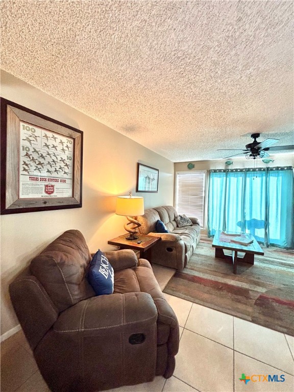 438 15th Street Port O'Connor, TX 77982 - Photo 10 of 26 a living room with furniture and a large window