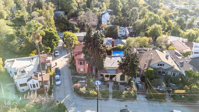 a view of multiple house with yard