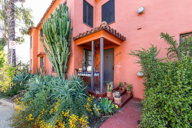 front view of a house with a small yard