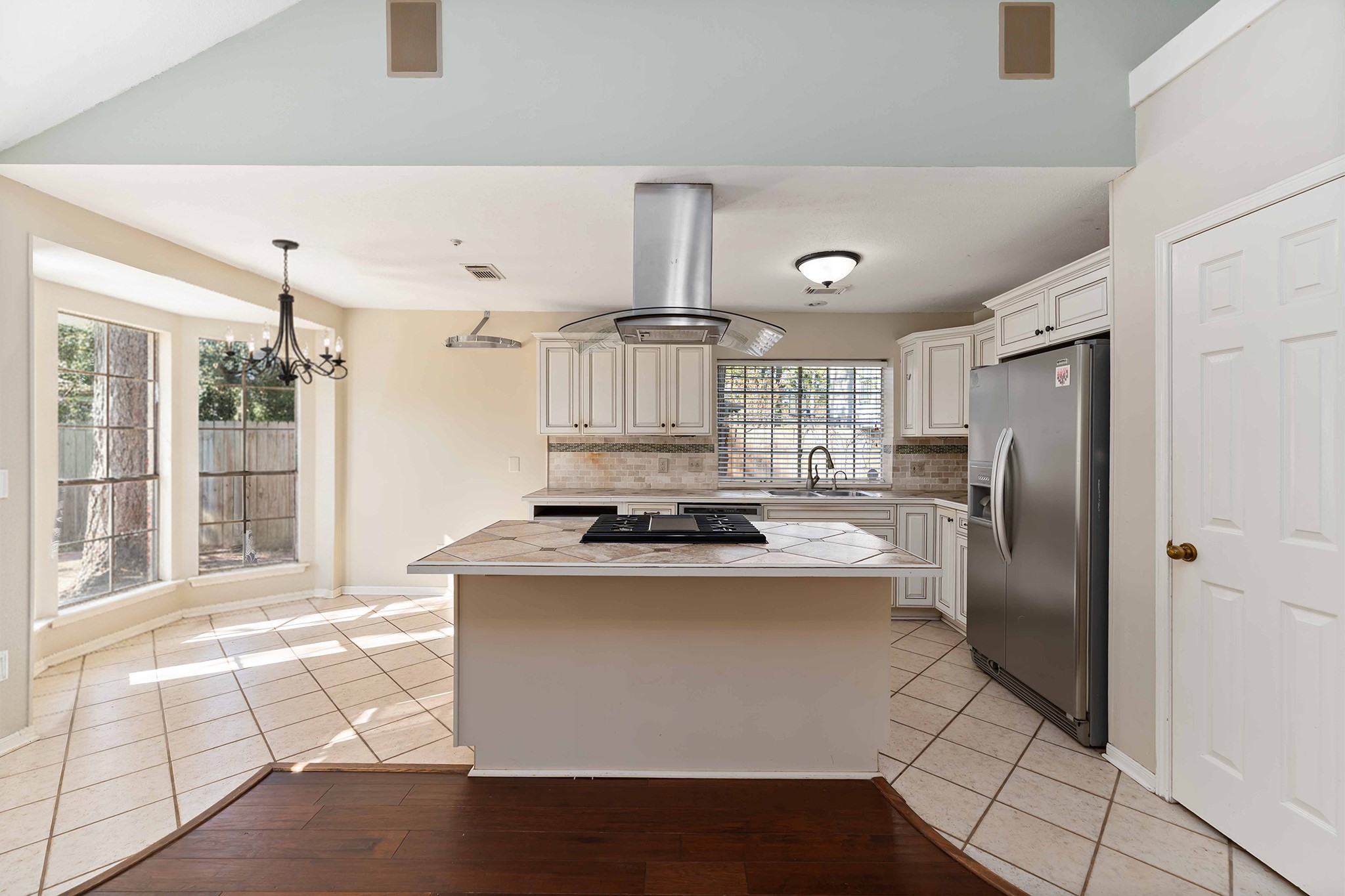 19927 Teller Boulevard Spring, TX 77388 - Photo 11 of 42 a kitchen with stainless steel appliances granite countertop a stove a refrigerator and a cabinets