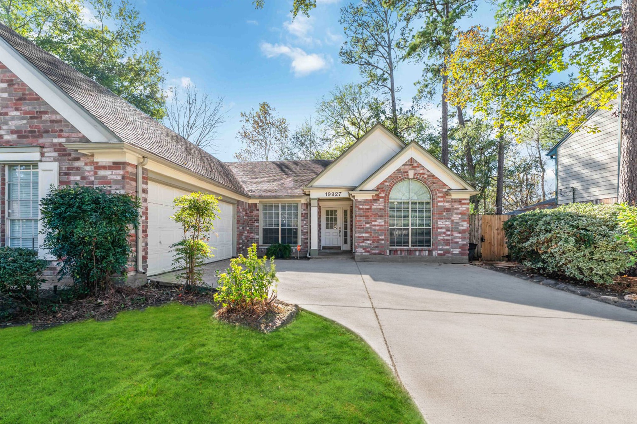 19927 Teller Boulevard Spring, TX 77388 - Photo 2 of 42 a front view of a house with garden