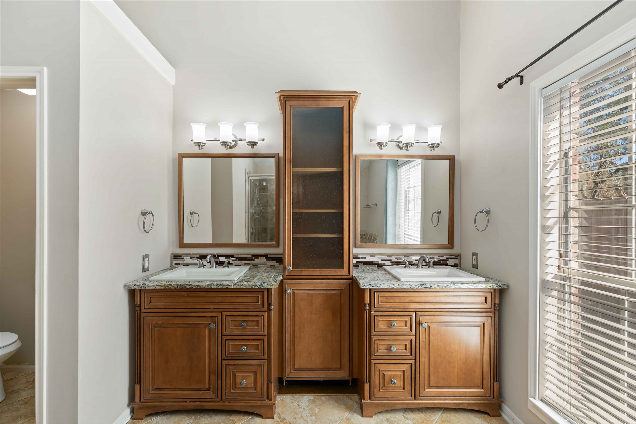 19927 Teller Boulevard Spring, TX 77388 - Photo 23 of 42 a kitchen with stainless steel appliances granite countertop a stove and a refrigerator