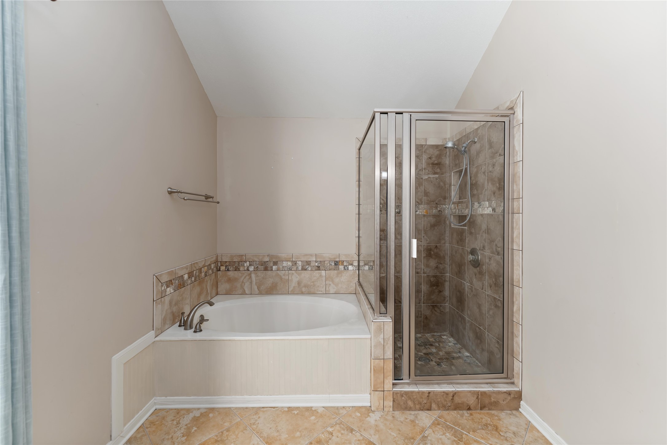 19927 Teller Boulevard Spring, TX 77388 - Photo 24 of 42 a white bath tub sitting next to a shower