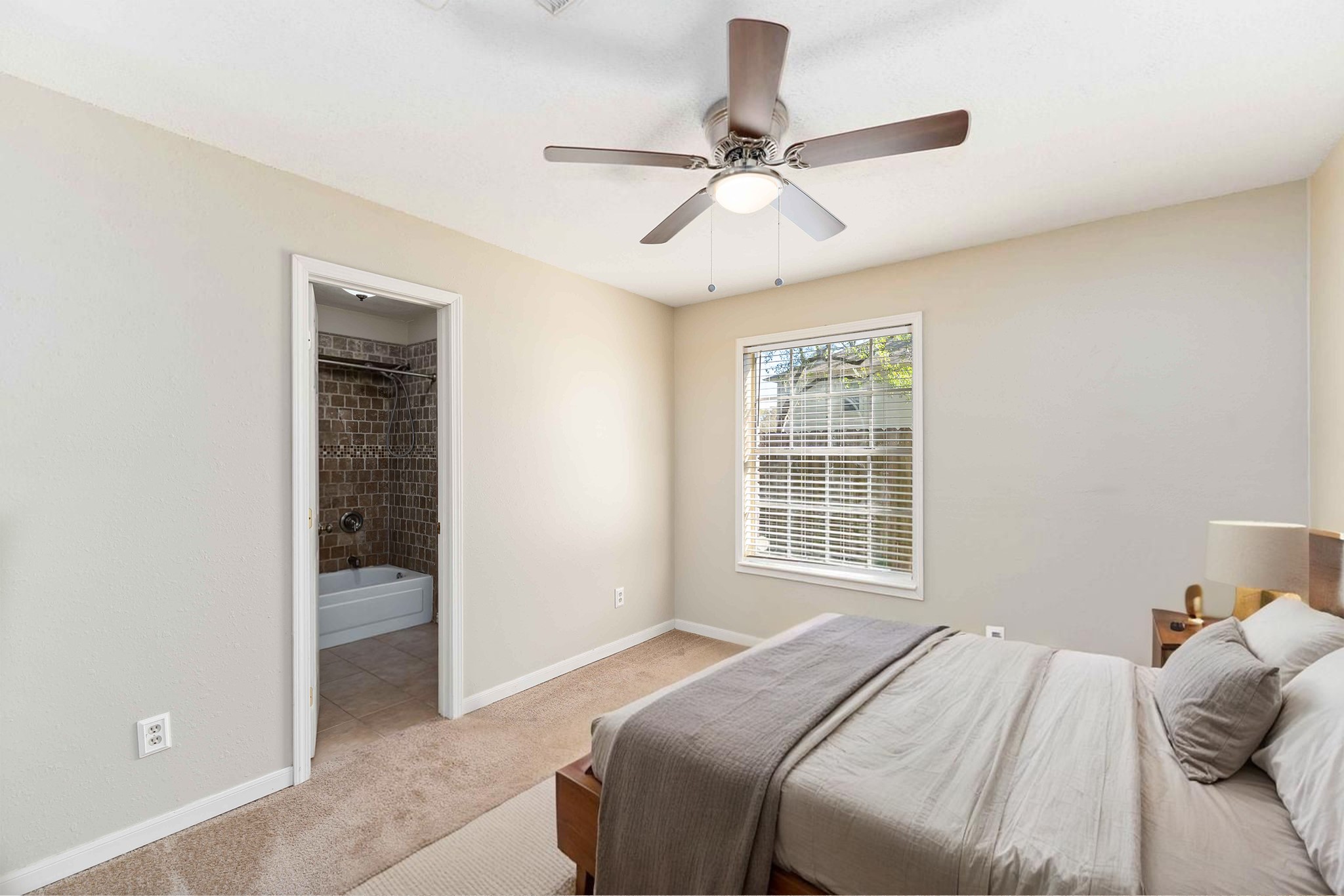 19927 Teller Boulevard Spring, TX 77388 - Photo 28 of 42 a bedroom with a bed and a window