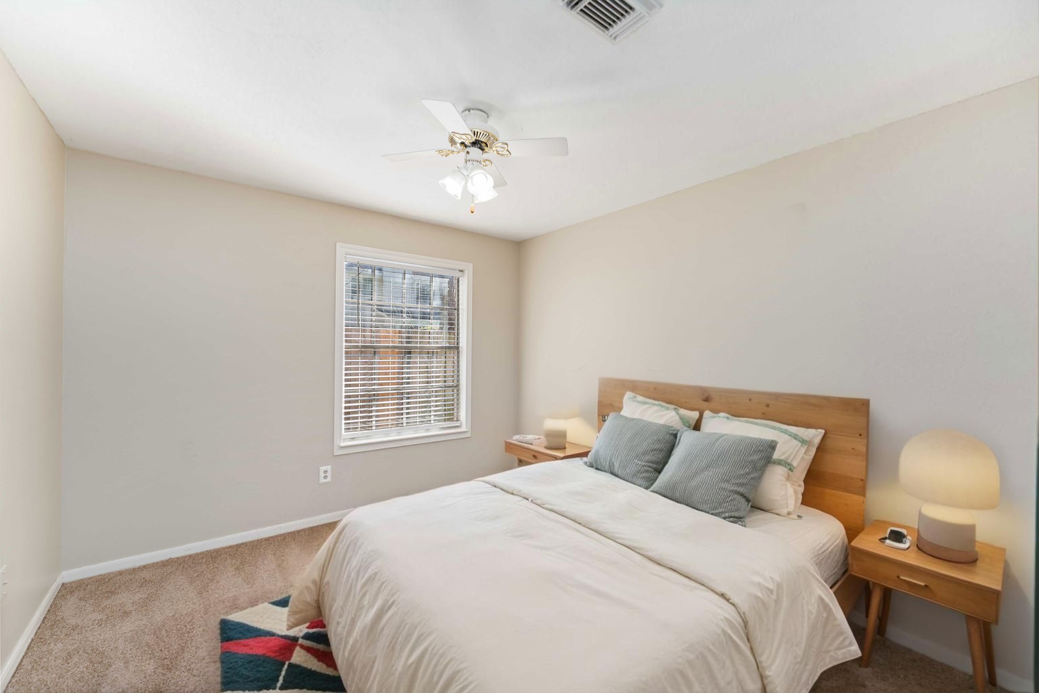 19927 Teller Boulevard Spring, TX 77388 - Photo 31 of 42 a bedroom with a large bed and a window