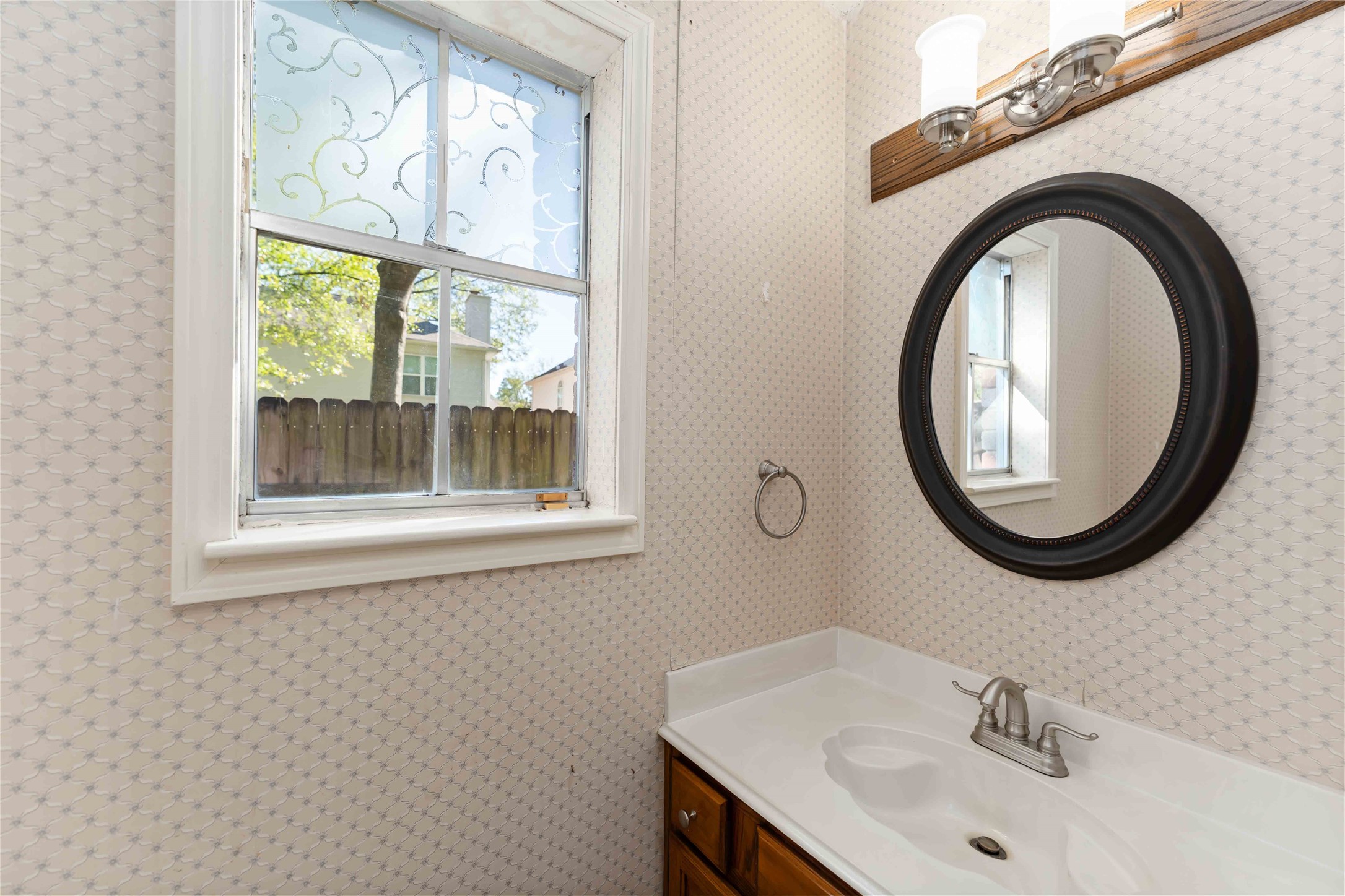19927 Teller Boulevard Spring, TX 77388 - Photo 34 of 42 a bathroom with a sink and a mirror