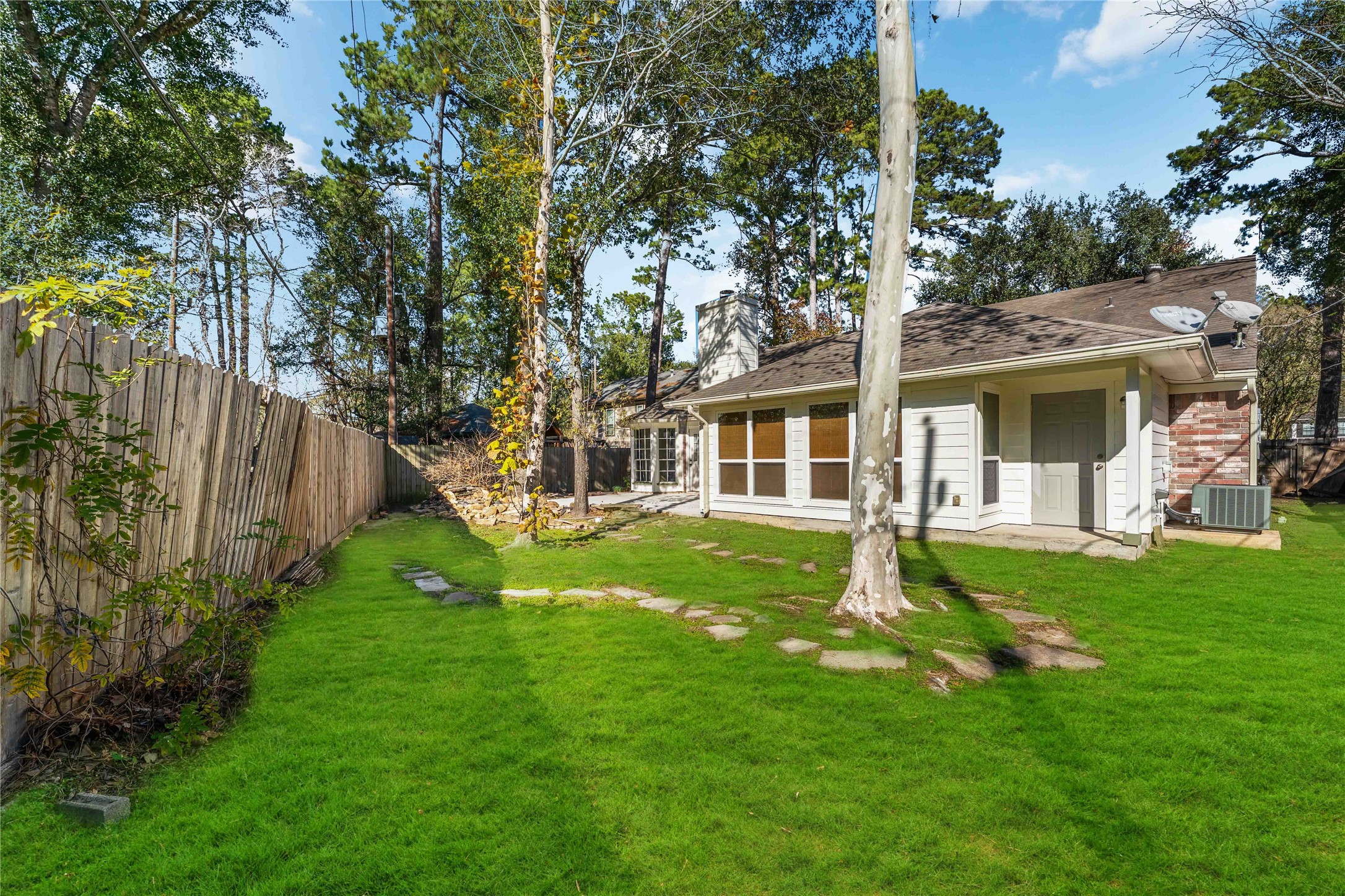 19927 Teller Boulevard Spring, TX 77388 - Photo 37 of 42 a front view of a house with a garden