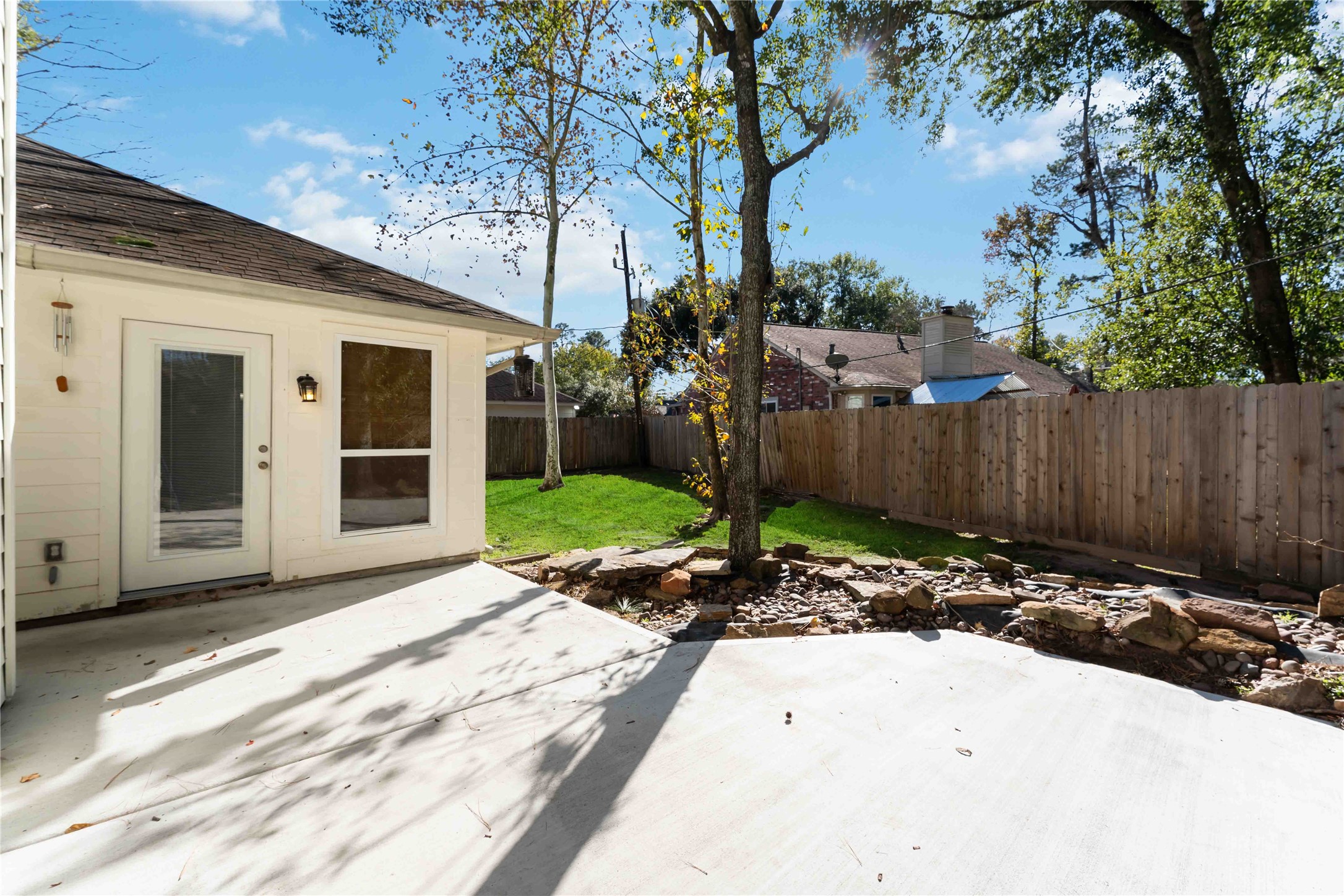 19927 Teller Boulevard Spring, TX 77388 - Photo 39 of 42 a view of a backyard with a tree