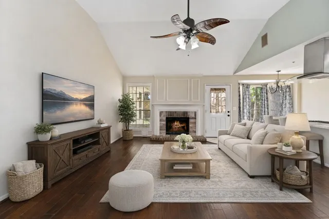 a kitchen with stainless steel appliances granite countertop a stove a refrigerator and a cabinets