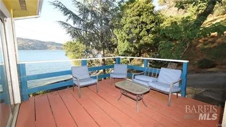 view of living room with furniture and large window