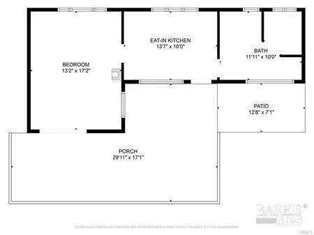 a aerial view of a house with a yard