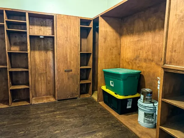 a bathroom with a mirror and a sink