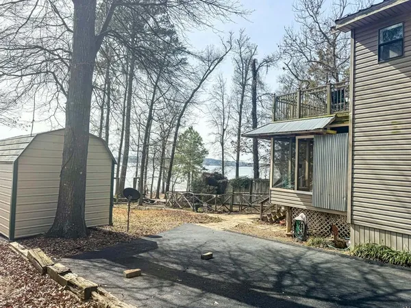 a backyard of a house with lots of green space