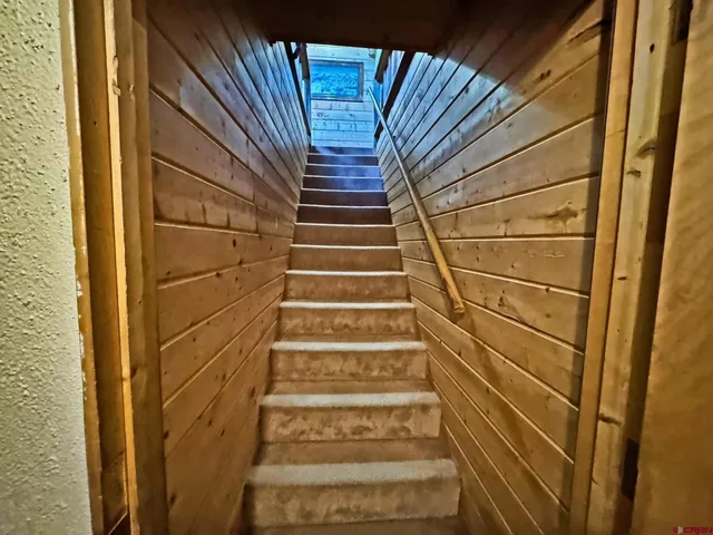 a view of entryway with a front door