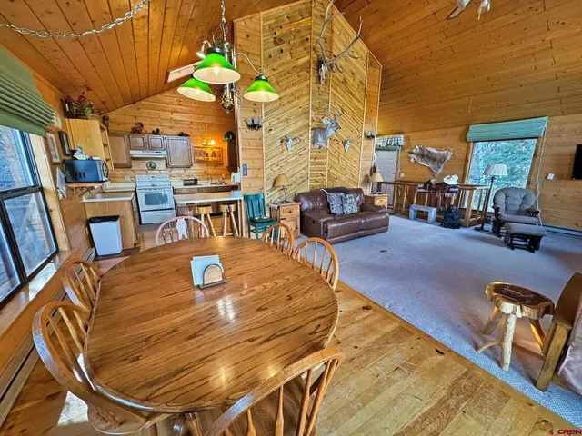 a living room with patio furniture
