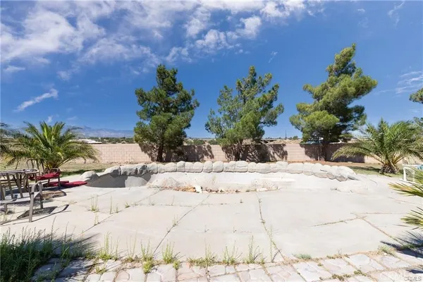a view of a backyard of a house