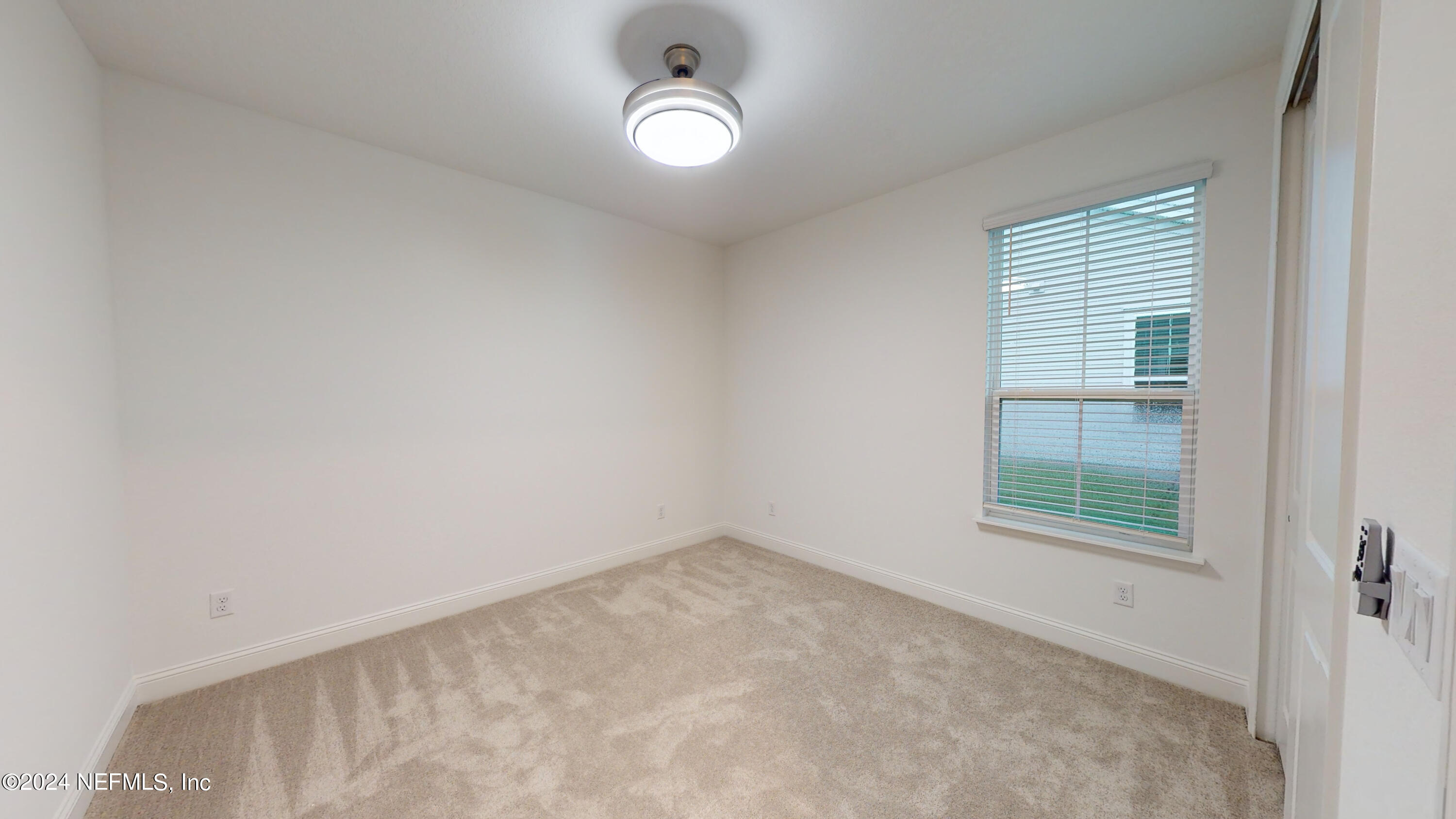 52 Tyson Ct Street St. Augustine, FL 32092 - Photo 16 of 31 an empty room with windows