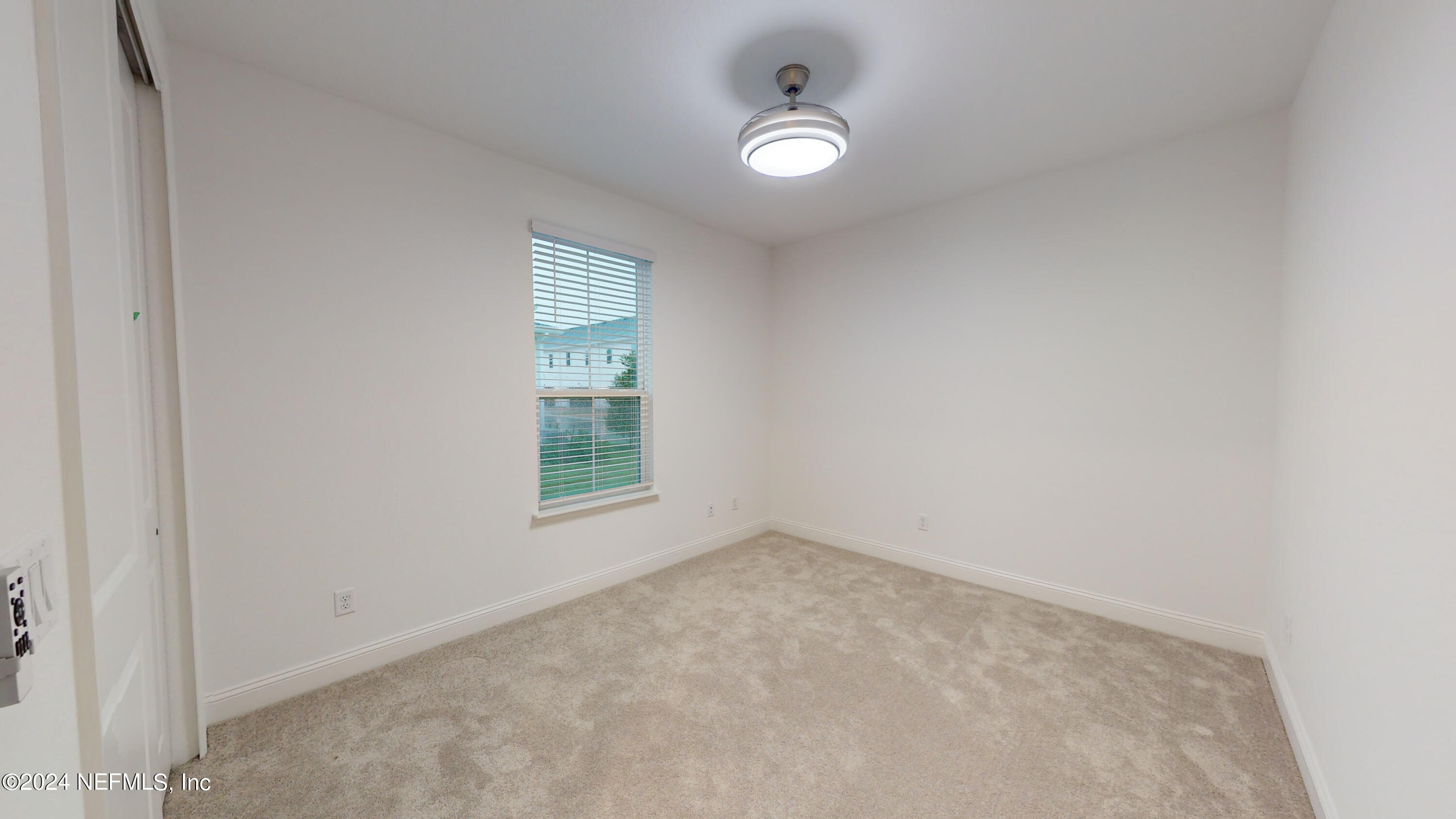 52 Tyson Ct Street St. Augustine, FL 32092 - Photo 17 of 31 an empty room with windows