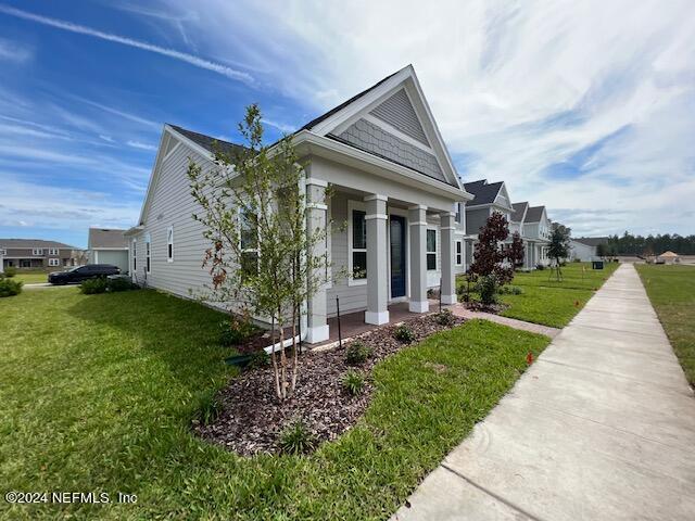 52 Tyson Ct Street St. Augustine, FL 32092 - Photo 3 of 31 a view of a house with a yard
